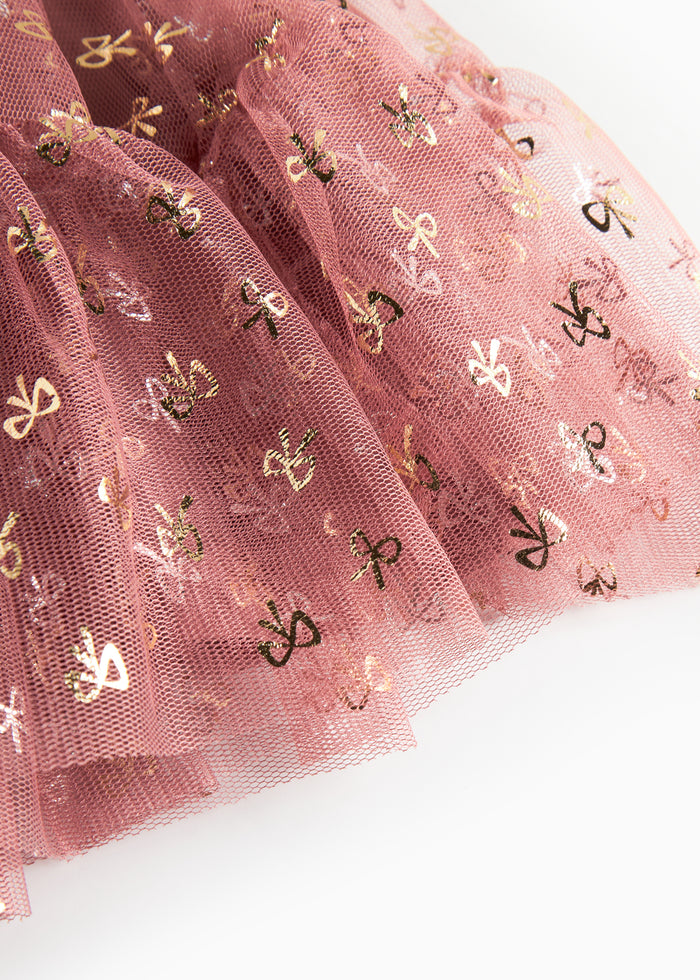 Pink festive baby dress in tulle with ruffles and gold print