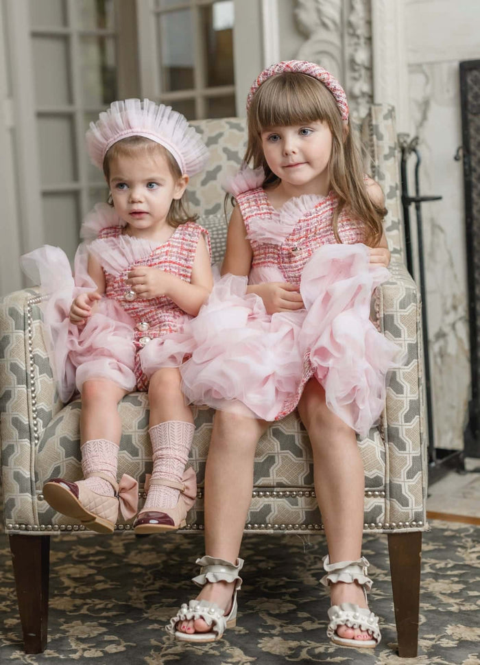 Kellie Crown Hair Sash styled on toddler model, highlighting delicate blush pink pleated tulle crown headband for flower girls, birthdays, and formal events.