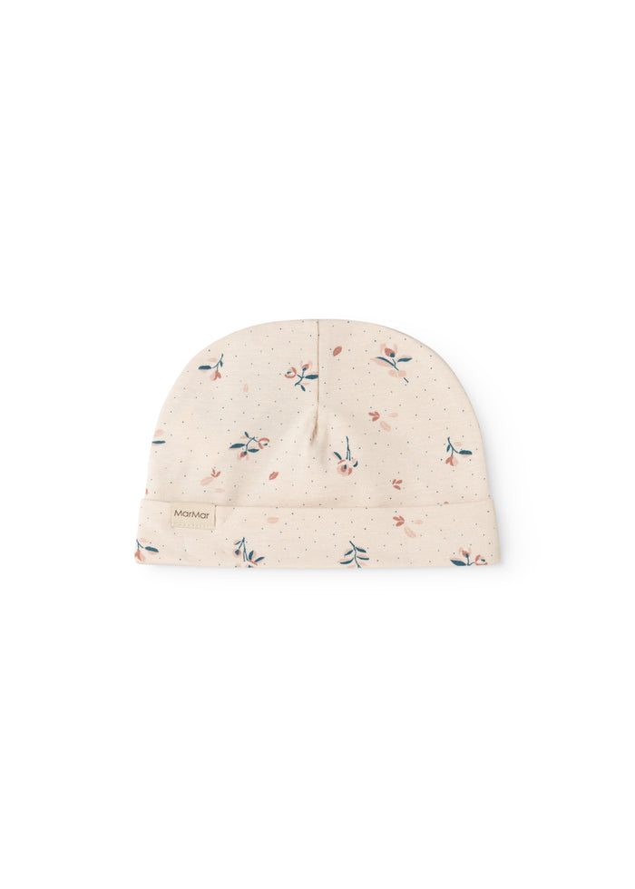 Beige babyhue med små blomsterprint og foldet kant