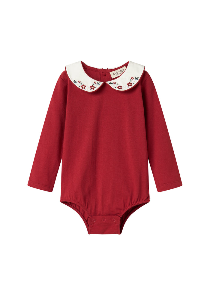 Christmas red baby bodystocking with white collar and fine floral embroidery