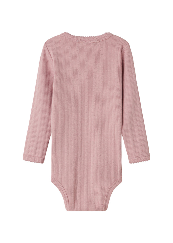 Pink pointelle bodysuit for children with long sleeves