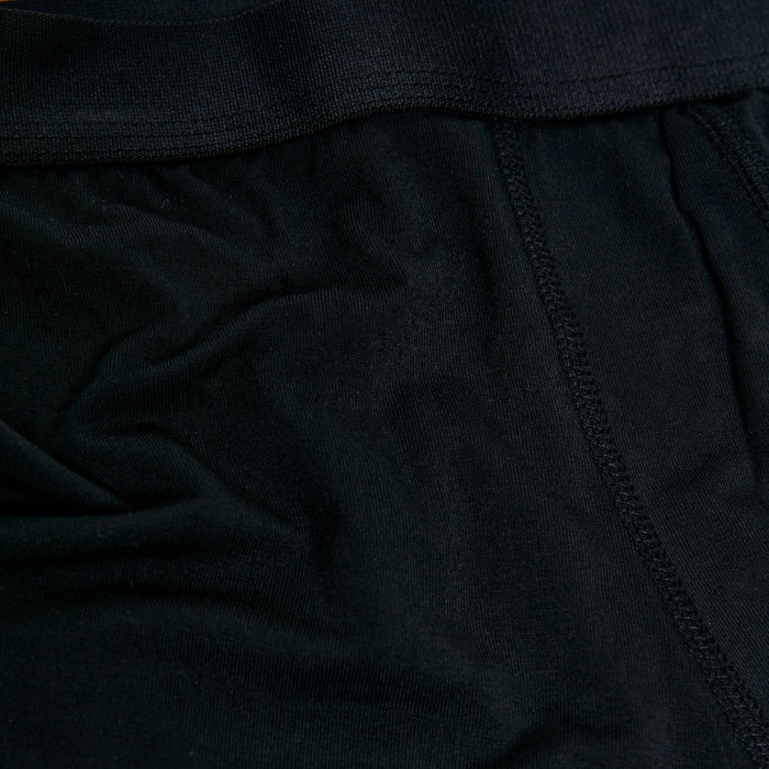 Black Boxer Trunks 6-Pack with stretchy waistband and visible stitching.