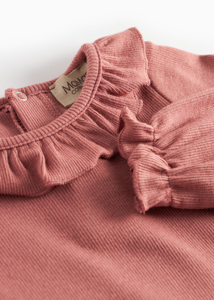 Dusty pink ribbed baby bodysuit with ruffle collar and long sleeves
