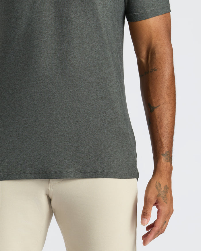 Charcoal Heather Gray Classic Polo with tattoos visible on forearm.
