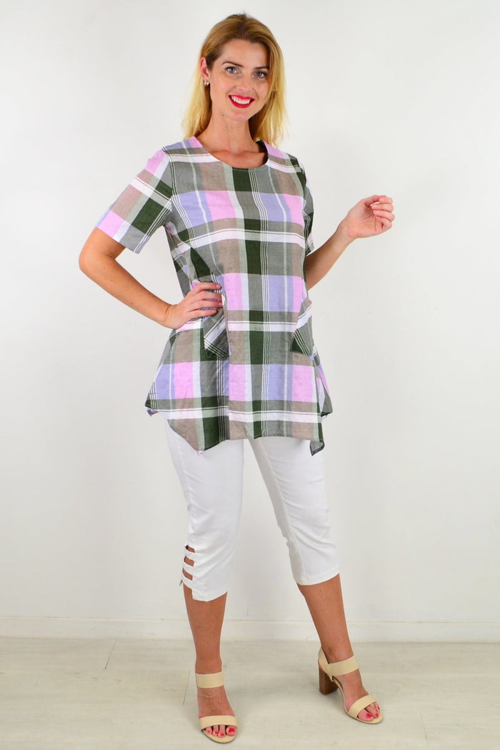 Elegant Check Out My Pocket Tunic Top in lightweight fabric with side pockets, displayed on a hanger against a neutral background.