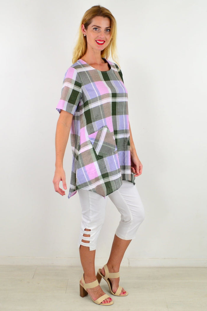 Elegant Check Out My Pocket Tunic Top, stylish women's tunic with pockets, in soft fabric, shown on a hanger.