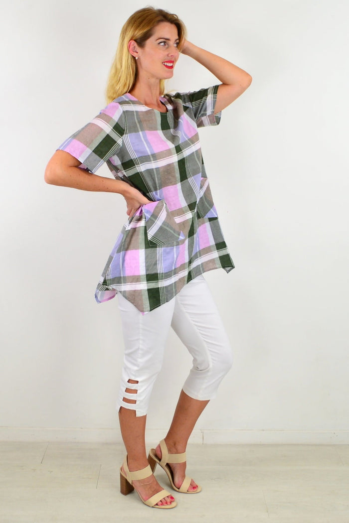 Elegant Check Out My Pocket Tunic Top, casual long sleeve tunic with pockets, displayed on a hanger against a neutral background.