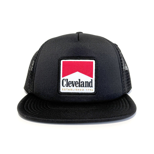 Black trucker cap with a red and white logo on a white background