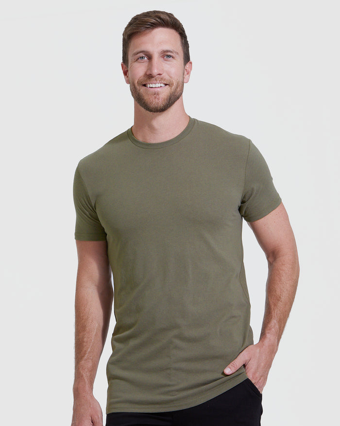 Man wearing Color Tall Straight Hem Crew Neck T-Shirt, olive-green, smiling.