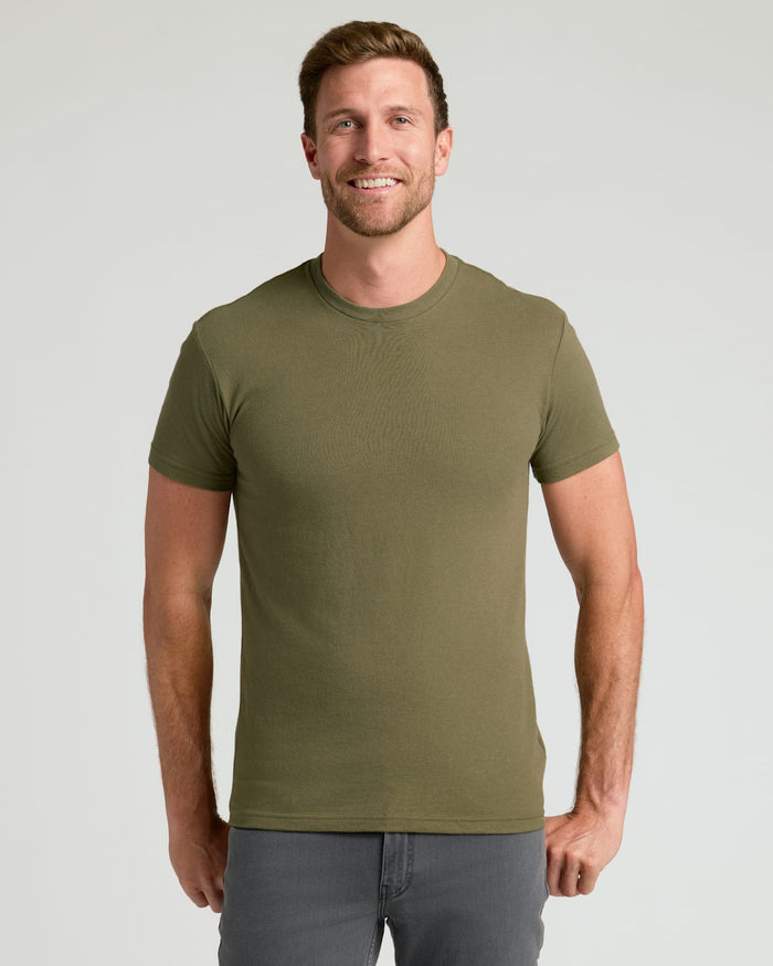 Man wearing Classic Crew 10-Pack olive-green T-shirt, smiling.