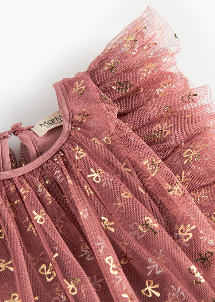 Pink festive baby dress in tulle with ruffles and gold print