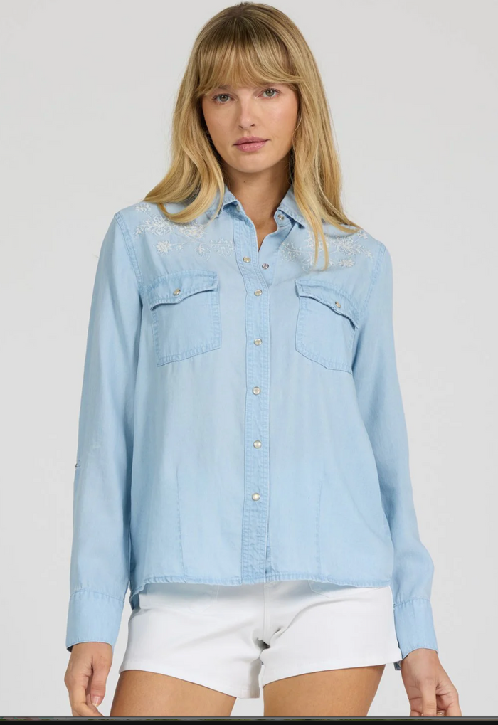 denim top with floral embroidery