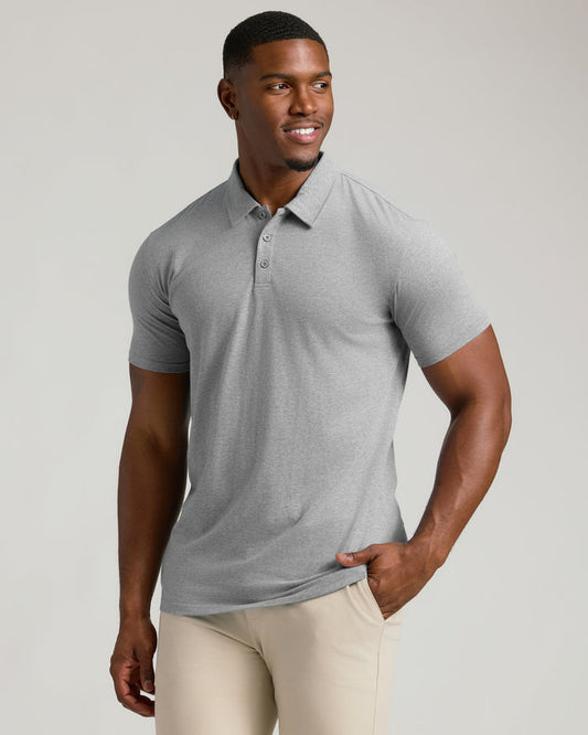 Heather Gray Short Sleeve Tall Polo worn by a smiling young man.