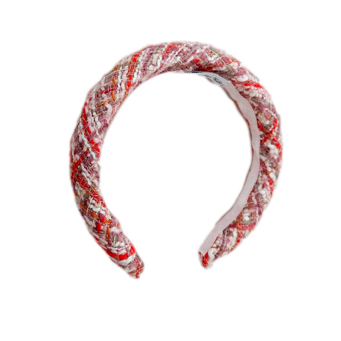 Kellie Pink Tweed Headband featuring structured padded silhouette in pink and red woven tweed with satin lining – luxury girls boutique hair accessory.