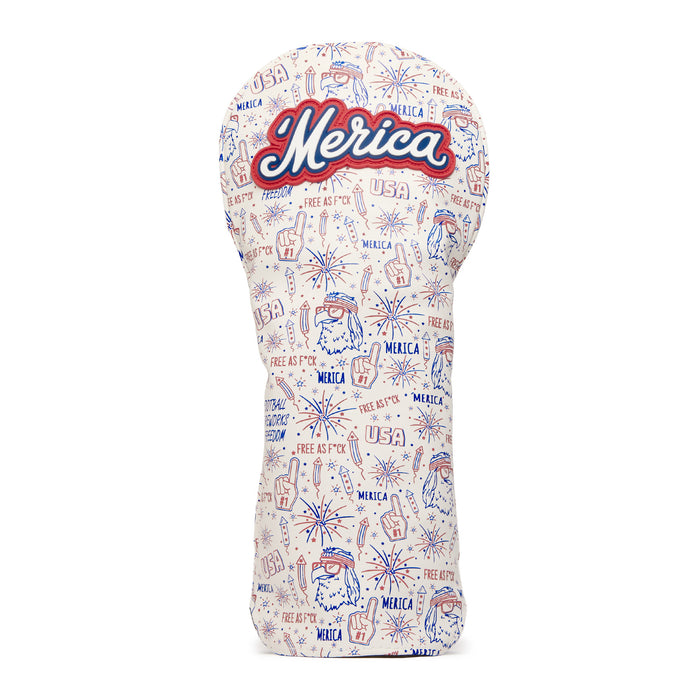 A golf club headcover decorated with red, white, and blue patriotic doodles, including fireworks, eagles, foam fingers, and the words “USA,” “Merica,” and “Free As F*ck,” with “Merica” boldly embroidered at the top in cursive script.