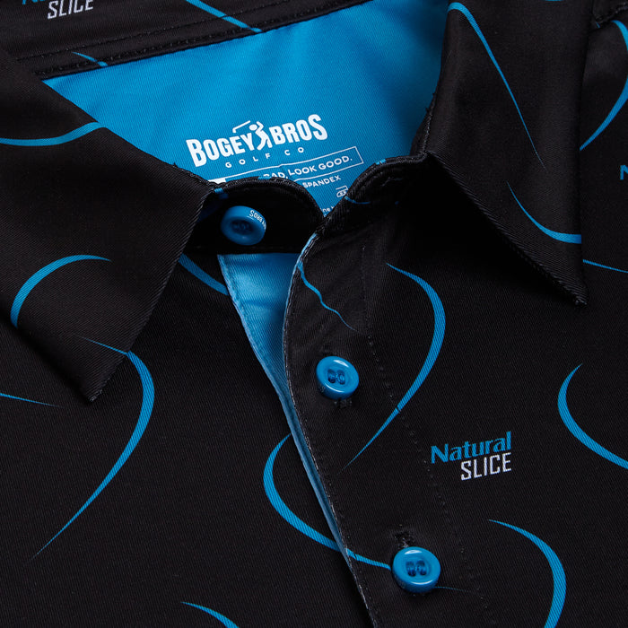 Close-up of the Natural Slice - Polo: a black collared shirt with blue swirl patterns and blue buttons, athletic fit, and “Natural SLICE” embroidered on one side. Inside label: “BOGEY BROS GOLF CO.” with care and sizing info.