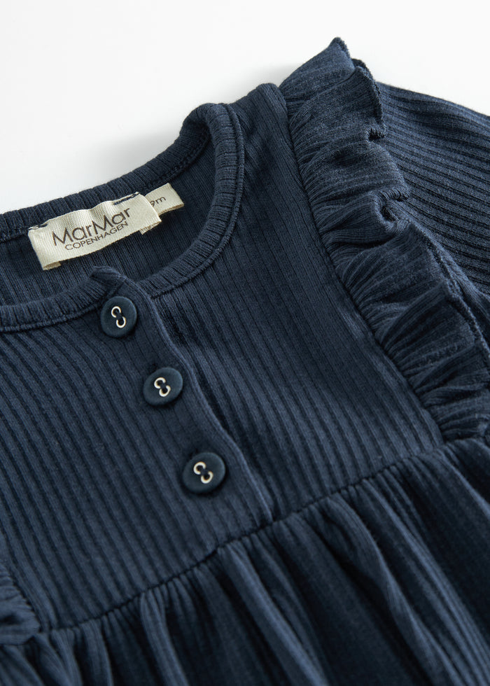 Dark blue ribbed dress for children with ruffle details and long sleeves