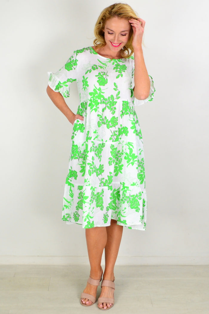 Hourglass Play in the Park tiered tunic dress, light fabric, sleeveless design, and tiered skirt perfect for casual summer wear.