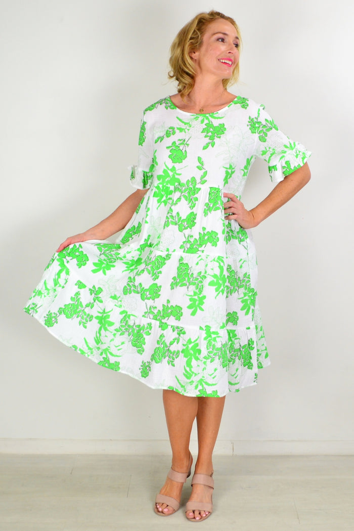 Hourglass Play in the Park tiered tunic dress shown on a model, featuring a flowy, layered design perfect for casual wear.