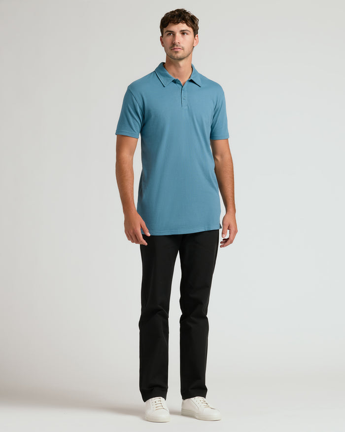 Sapphire Short Sleeve Tall Polo on model, showcasing fit and style.