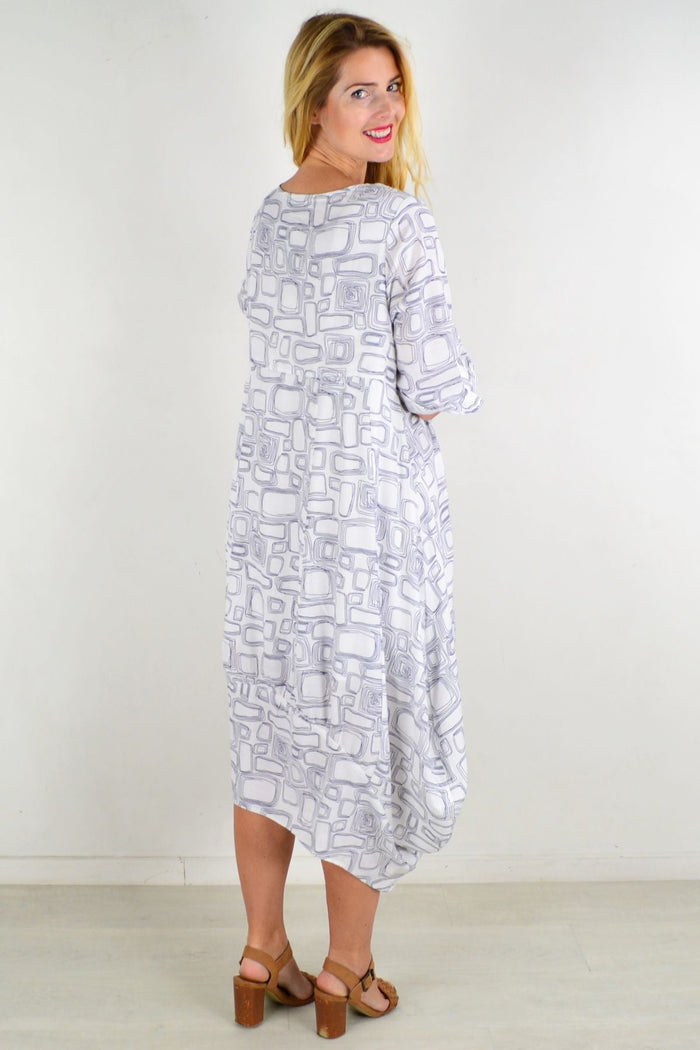 White Block Bubble Tunic Dress by Willow Tree, featuring a loose fit with bubble-style design and long sleeves, displayed on a mannequin.
