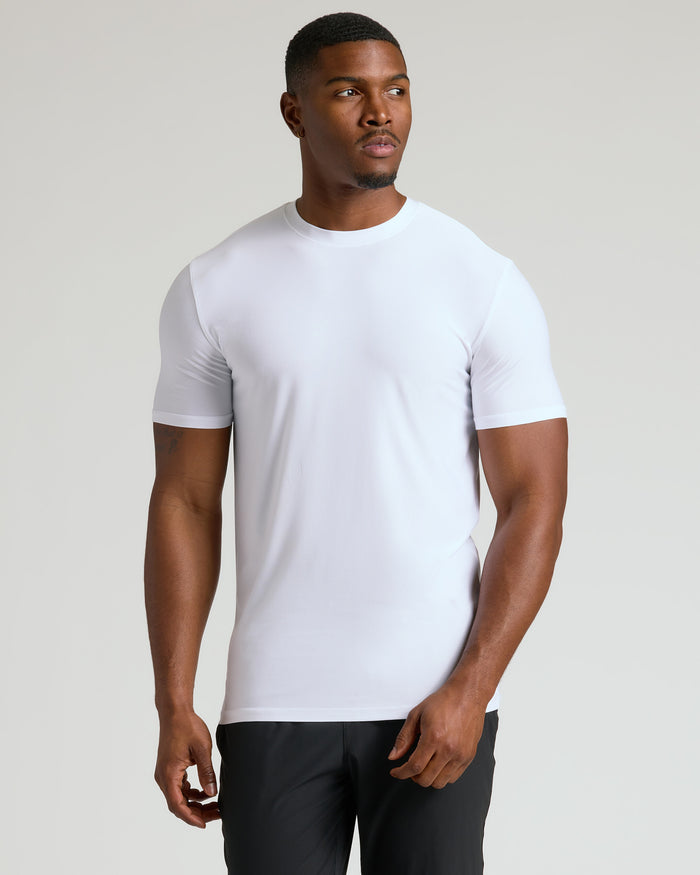 White Tall Active Crew Neck 2.0 on male model, studio setting.