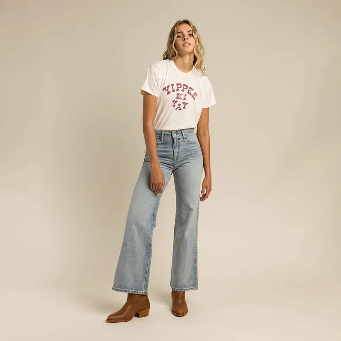 FW23 Studio Model in jeans and Yippee Ki Yay tee